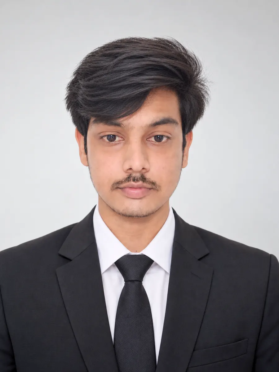 Saad, founder of BrassNorth, wearing a black suit and tie.